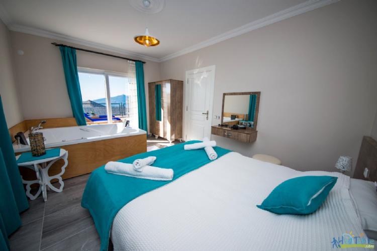 VİLLA HONEY- Kalkan İslamlar'da korunaklı 1+1 balayı villası